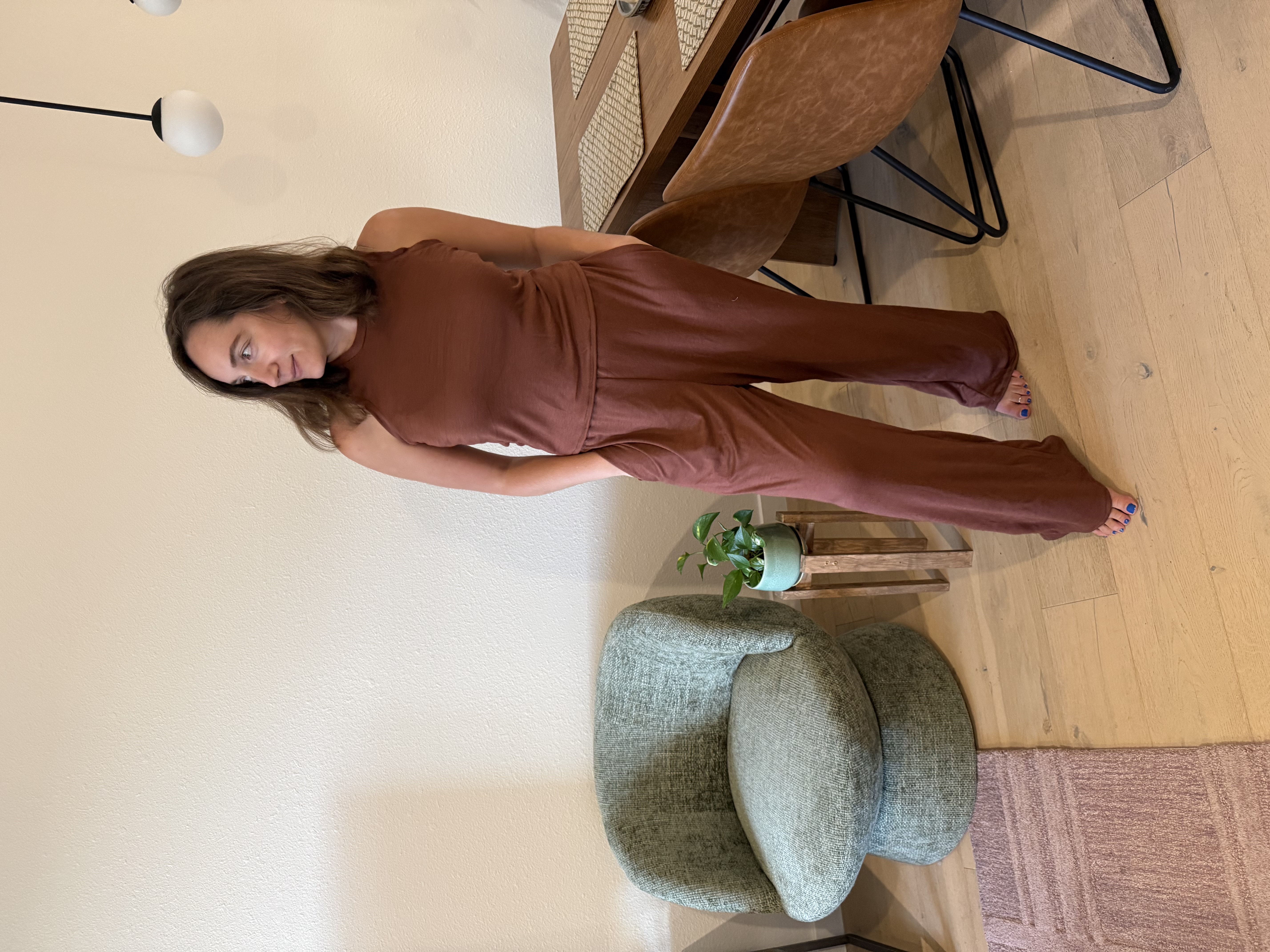 Emily wearing the matching brown Sally pants and Sylvan tank set